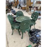 A VINTAGE CAST IRON BISTRO SET WITH ROUND TABLE AND FOUR CHAIRS