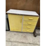 A RETRO WOODEN KITCHEN UNIT