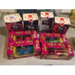 FOUR BROOKE BOND BUMP AND GO TOY MODEL CARS AND FOUR BOXES OF TROLLS