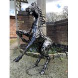 A LARGE METAL SCULPTURE IN THE FORM OF A REARING HORSE H: 125CM