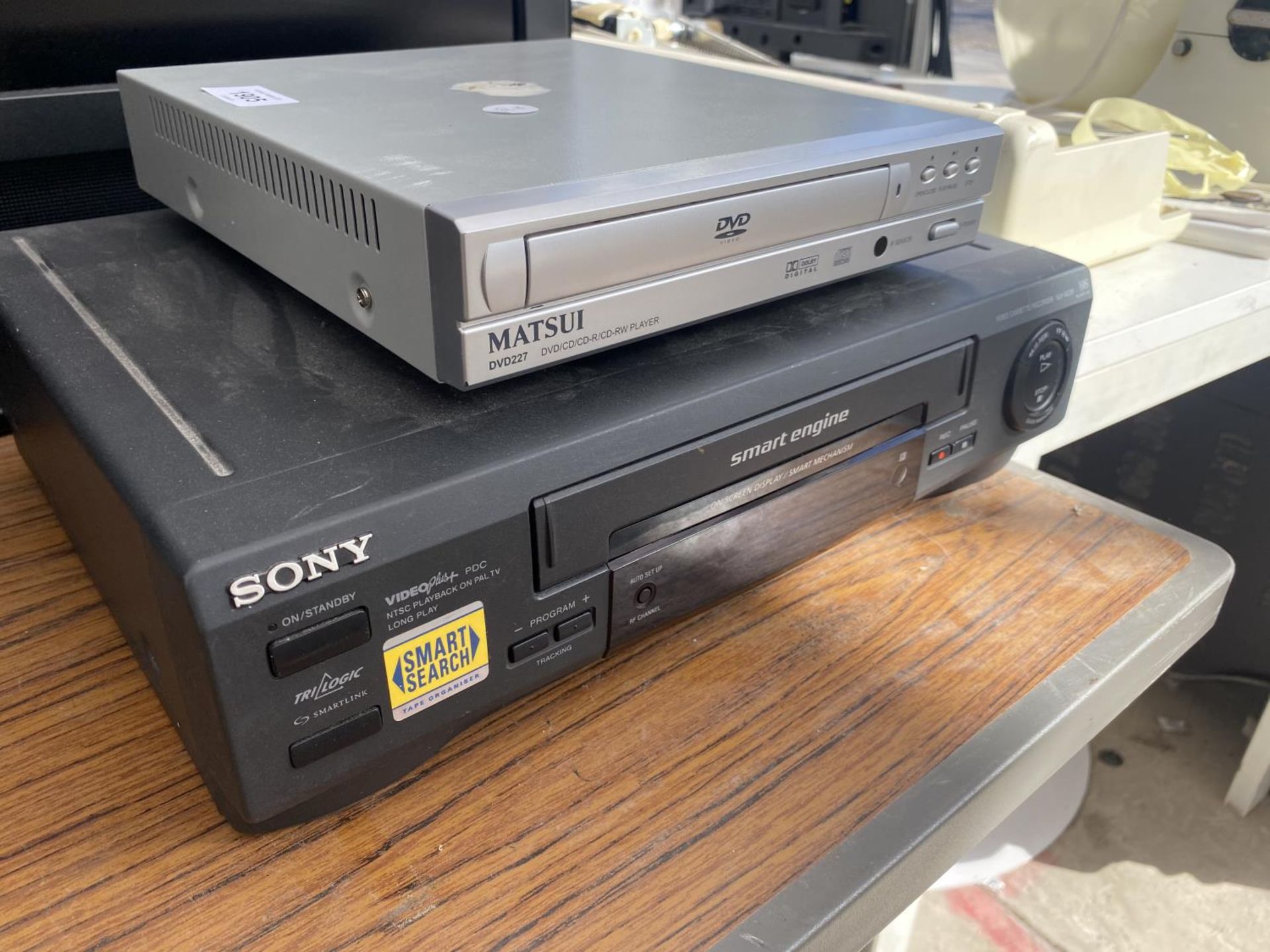 A MATSUI DVD PLAYER AND A FURTHER SONY VHS PLAYER