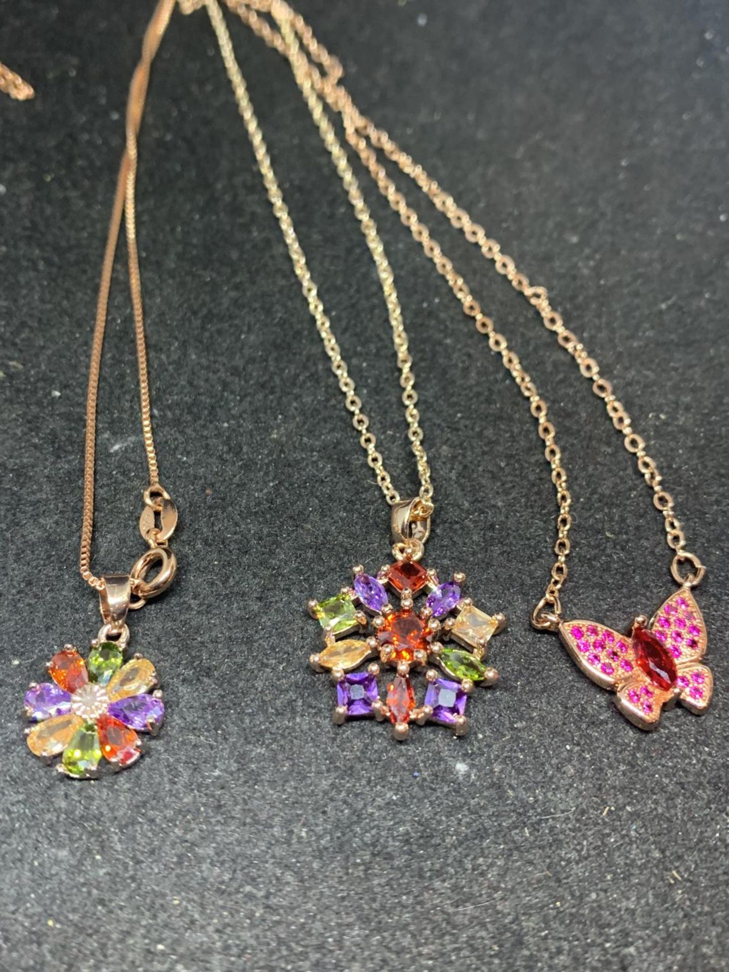 SIX SILVER NECKLACES WITH ROSE GILT AND COLOURED STONE PENDANTS - Image 3 of 3