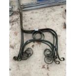 THREE VINTAGE CAST IRON BENCH ENDS