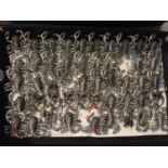 A TRAY OF SCORPION DRESS RINGS