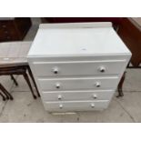 A WHITE PAINTED CHEST OF THREE DRAWERS