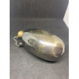 AN UNUSUAL OVOID SHAPED SILVER PLATED POWDER FLASK WITH ATTACHED CARRY CHAIN AND STOPPER - MAKER