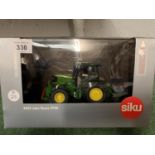 A BOXED SIKU 4452 JOHN DEERE 5720 TRACTOR