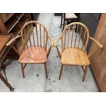 A PAIR OF ELM/BEECH ELBOW CHAIRS MARKED A.D.