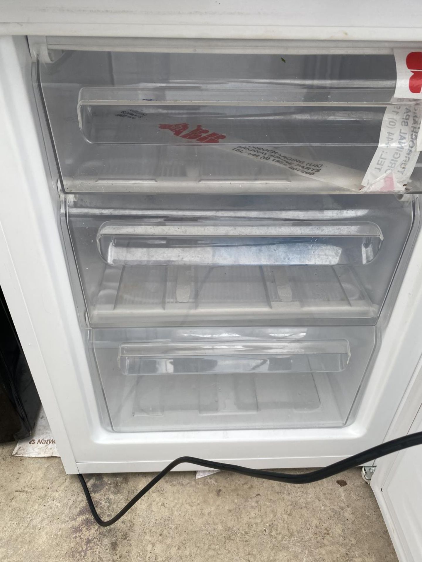 A WHITE FRIGIDAIRE UPRIGHT FRIDGE FREEZER BELIEVED IN WORKING ORDER BUT NO WARRANTY - Image 5 of 5