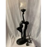 A SPELTER TABLE LAMP IN THE FORM OF A NUDE H:WITH GLASS SHADE 79CM (REPAIR TO HAND)
