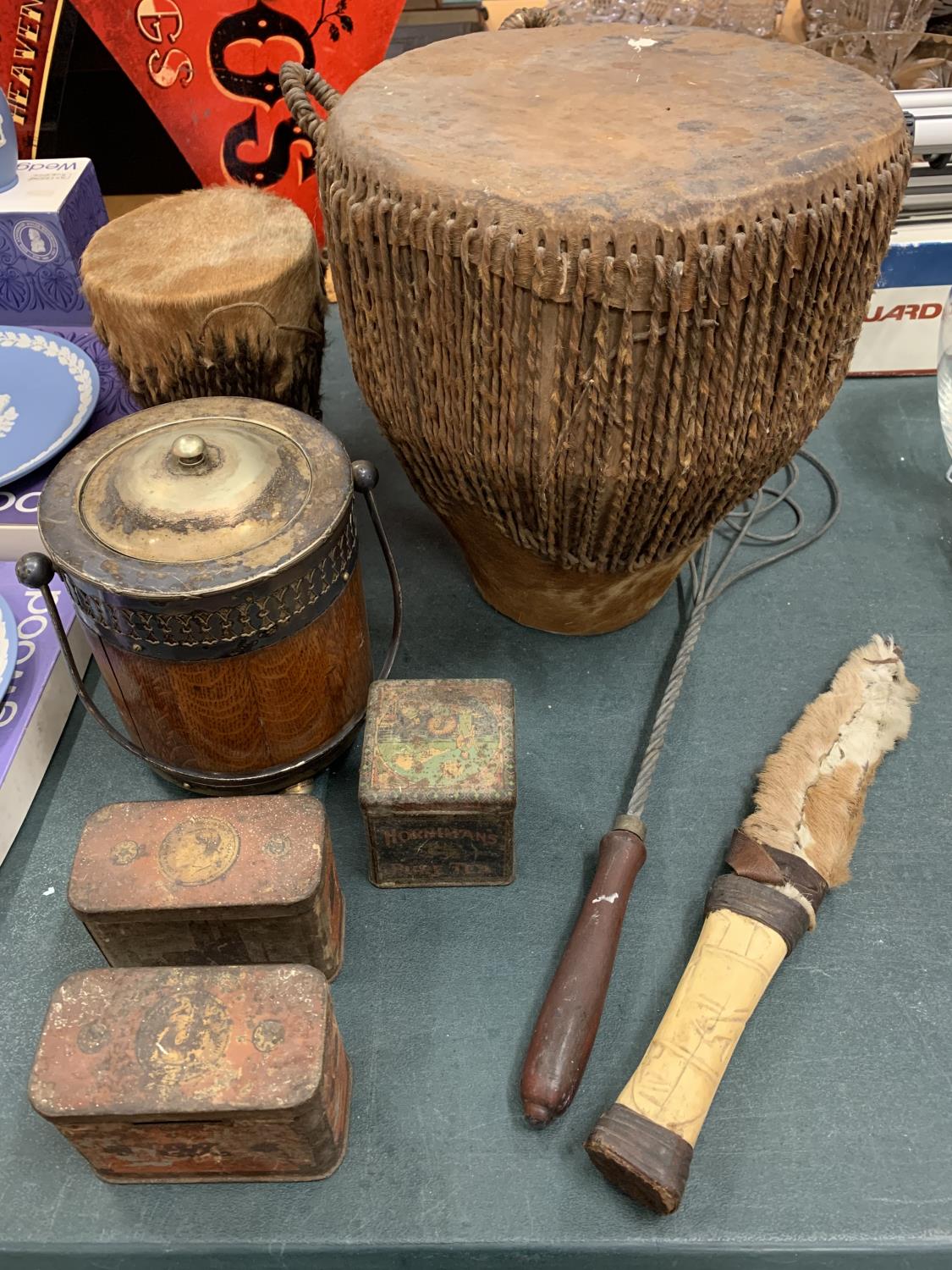 AN ASSORTMENT OF ITEMS TO INCLUDE BONGOS, OXO AND TEA TINS, CARPET BEATER ETC