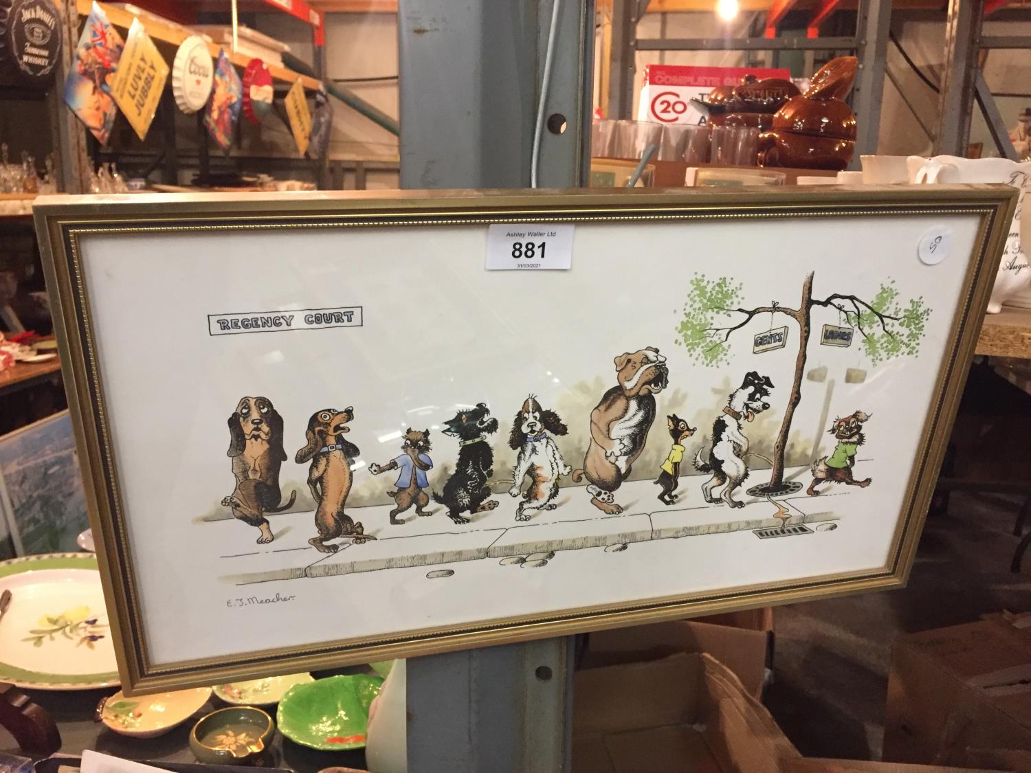 A SMALL GILT FRAMED COMEDIC CARTOON FEATURING DOGS