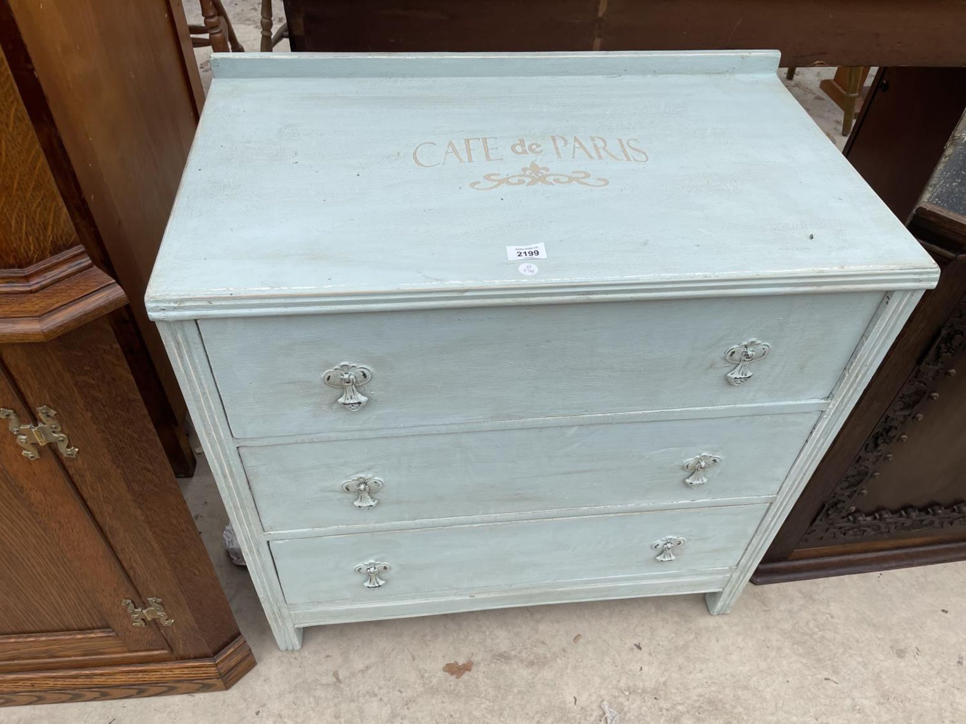 A SHABBY CHIC THREE DRAWER CHEST PAINTED 'CAFE DE PARIS', 30" WIDE