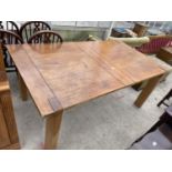 A LARGE OAK FUNCTION TABLE 71" X 39" WITH EXTRA LEAF