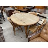 AN OAK VICTORIAN STYLE PINE DROP LEAF KITCHEN TABLE AND FOUR CHAIRS 59" X 42.5" OPEN