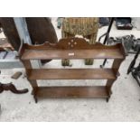 A VICTORIAN OAK THREE TIER WALL SHELF, 32" WIDE