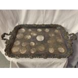 A LARGE ORNATE TWIN HANDLED SILVER PLATED DRINKS TRAY 45CM X 69CM