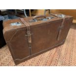 A LARGE VINTAGE BROWN LEATHER SUITCASE WITH CHROME FITTINGS