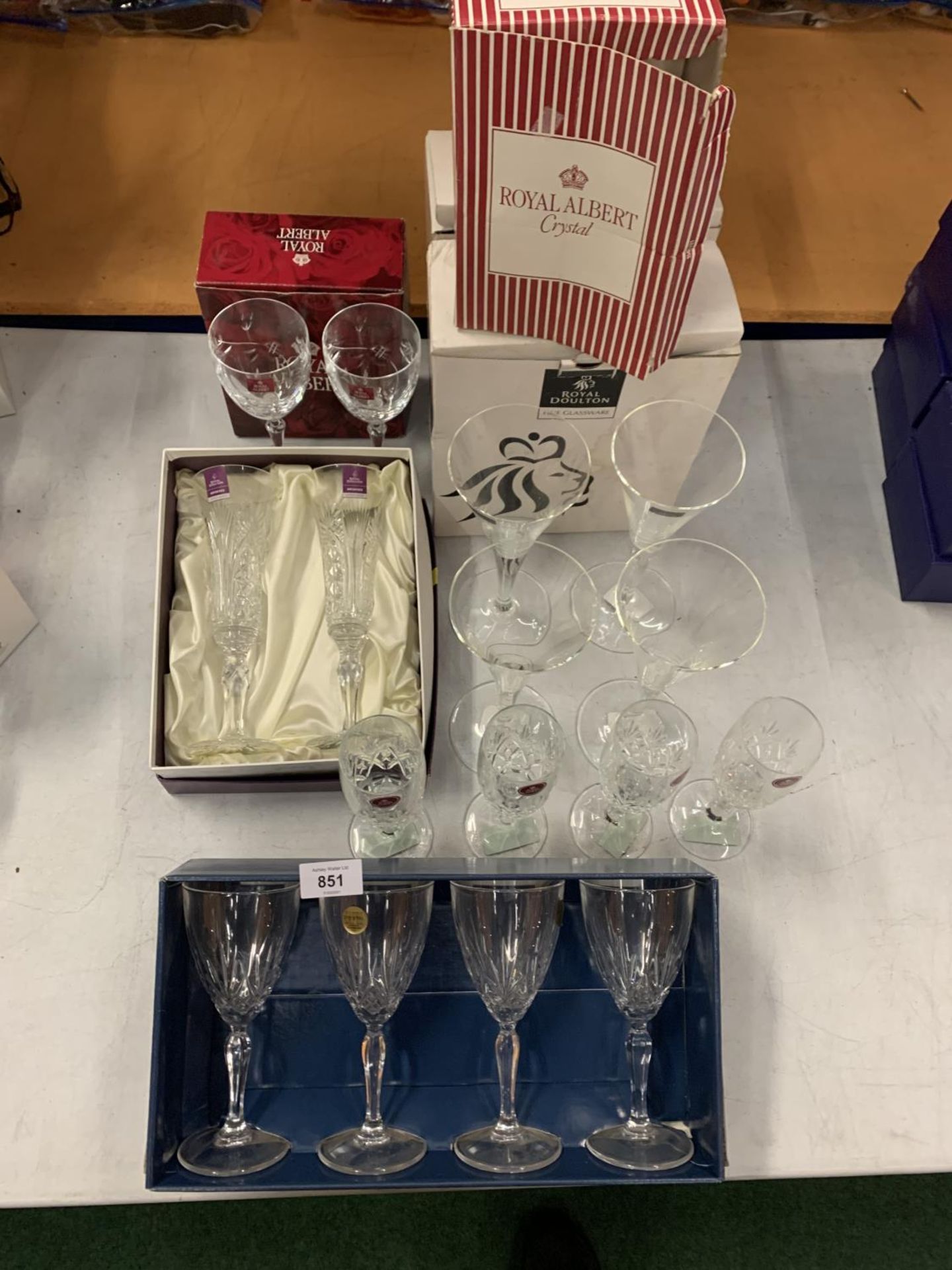 A COLLECTION OF CUT GLASS GLASSES TO INCLUDE WINE AND CHAMPAGNE