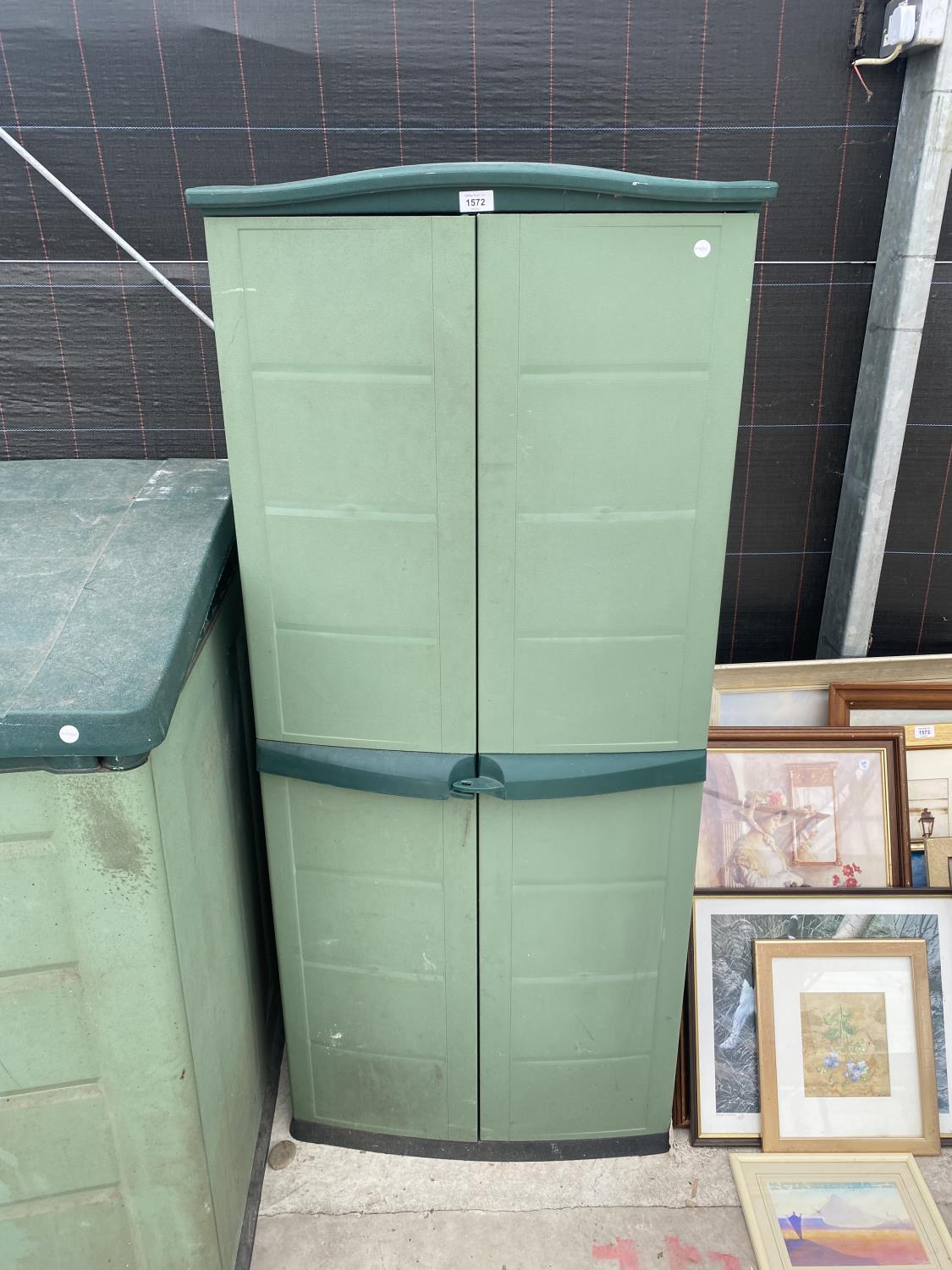 A PLASTIC GARDEN STORAGE UNIT