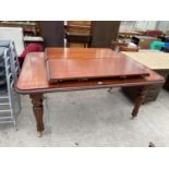 A VICTORIAN STYLE MAHOGANY PULL-OUT DINING TABLE ON TURNED AND FLUTED LEGS, 65x44" TOGHER WITH TWO