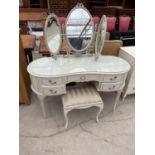 A WHITE/GILT KIDNEY SHAPED DRESSING TABLE WITH TRIPLE MIRROR AND A STOOL