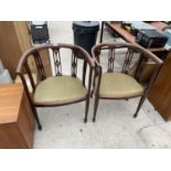 A PAIR OF EDWARDIAN MAHOGANY AND INLAID TUB CHAIRS WITH PIERCED SPLATS ON TAPERED LEGS WITH SPADE