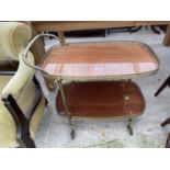 A MID 2OTH CENTURY BRASS TWO TIER DINNER TROLLEY WITH PIERCED RIMS