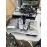 AN ASSORTMENT OF ELECTRICALS TO INCLUDE TWO DVD PLAYERS, REMOTE CONTROLS AND DVDS ETC