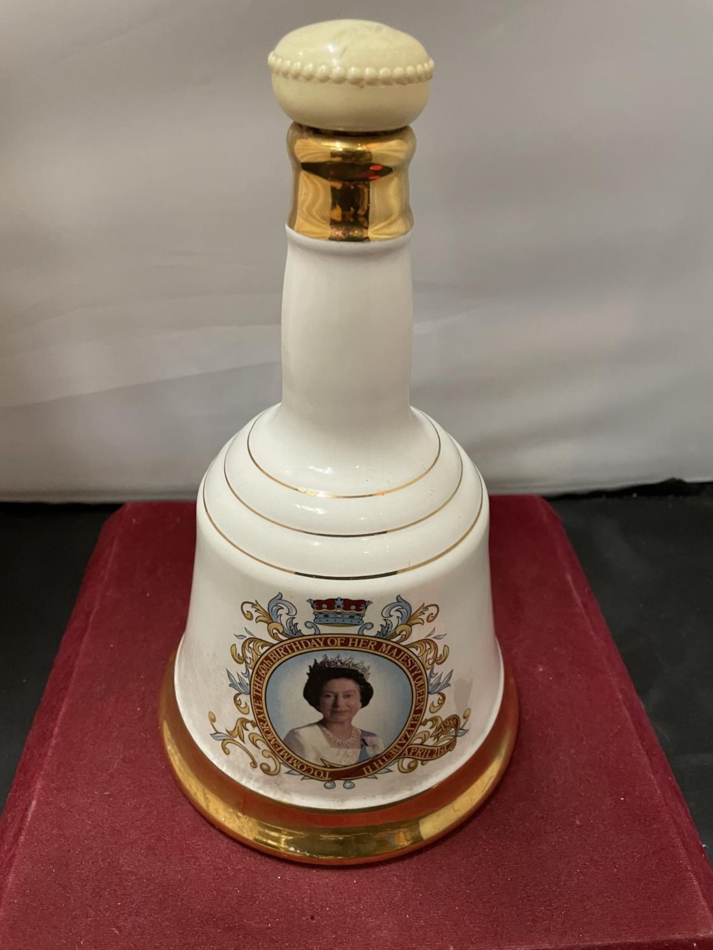 A 75 CL DECANTER OF BELLS TO COMMEMORATE THE 60TH BIRTHDAY OF QUEEN ELIZEBETH II