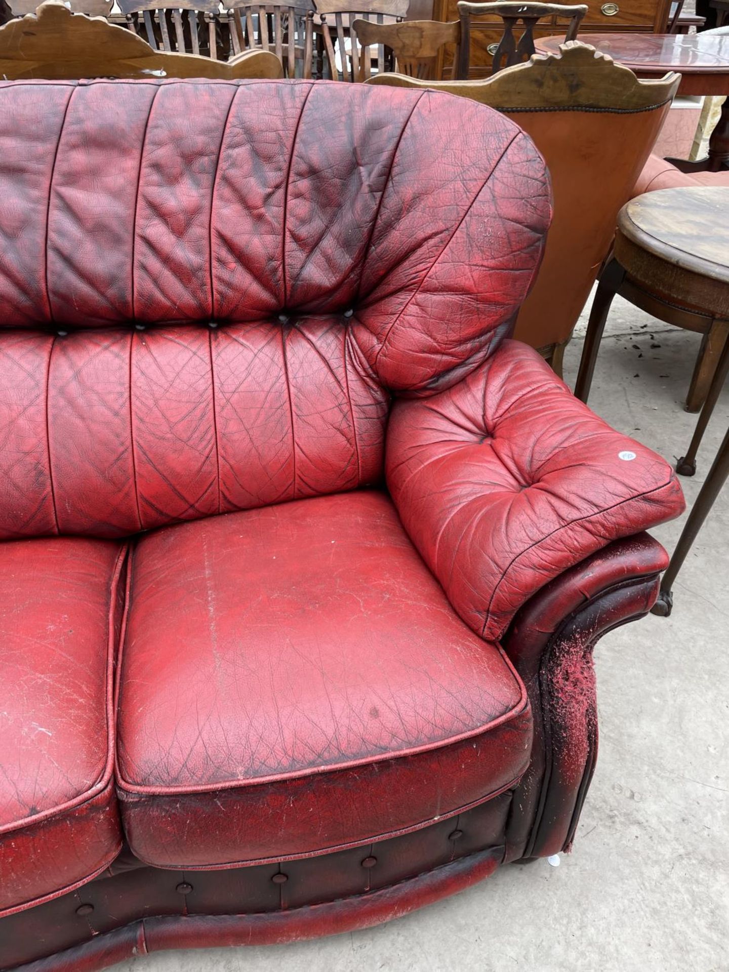 AN OXBLOOD THREE SEATER SETTEE - Image 5 of 7