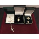 THREE SILVER NECKLACES WITH PENDANTS TO INCLUDE A CROSS, HEART AND A MOTHER OF PEARL ALL BOXED
