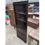 A PRIORY STYLE CORNER CUPBOARD
