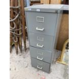 A FOUR DRAWER METAL FILING CABINET