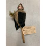 AN EARLY GERMAN BISQUE MUSICAL MAROTTE BY LIMBACH DOLL