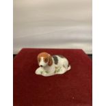 A ROYAL CROWN DERBY DOG WITH STOPPER