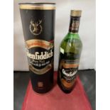 A 1 LITRE BOTTLE OF GLENFIDDICH PURE MALT WHISKY