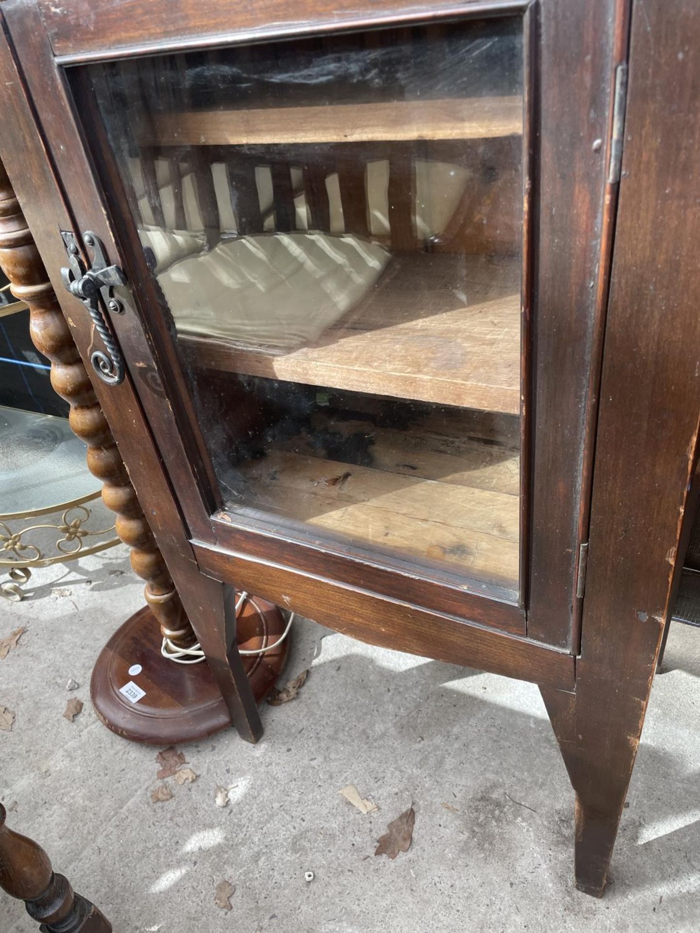 A VICTORIAN STAINED CAABINET WITH GLAZED OOR AND GALLERY BACK - Image 3 of 3