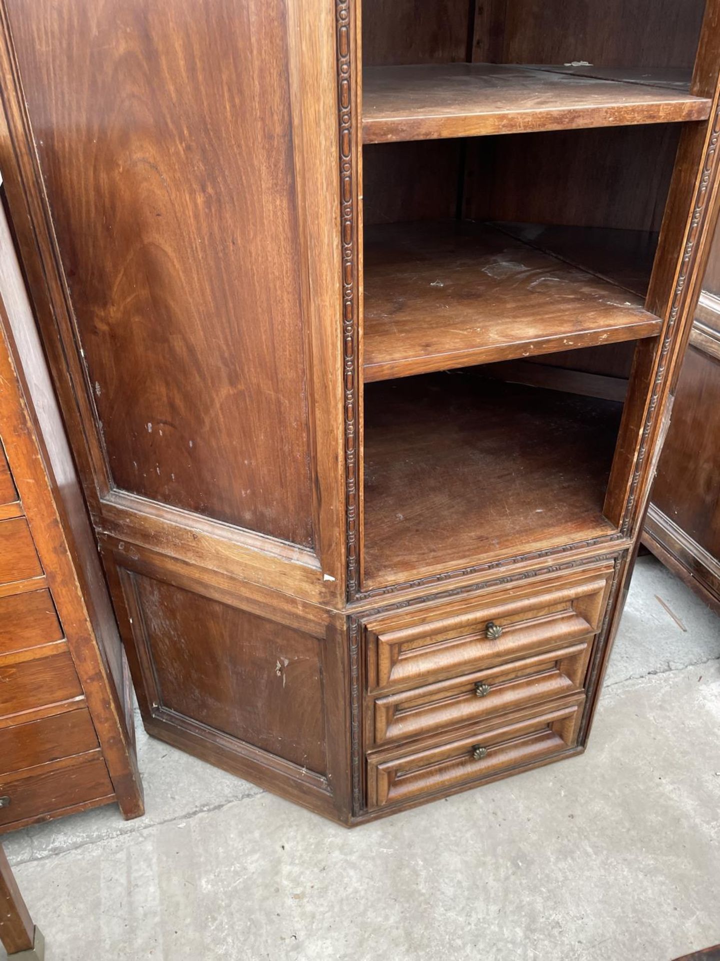 A SPANISH WALNUT HEAVILY PANELED CORNER CABINET WITH UPPER DOOR AND THREE DRAWERS WITH APPLIED BRASS - Image 3 of 3