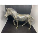 AN UNUSUAL SILVER PLATED ZEBRA - HEIGHT 15 CM