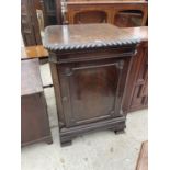 A WARING AND GILLOW LTD MAHOGANY SAFE CABINET WITH ROPE EDGE ON OGEE FEET IN THE CHIPPENDALE