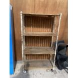 A VINTAGE THREE TIER METAL AND WOODEN SHELVING TROLLEY