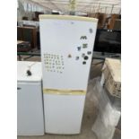 A WHITE UPRIGHT FRIDGE FREEZER BELIEVED IN WORKING ORDER BUT NO WARRANTY