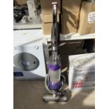 A DYSON DC25 VACUUM CLEANER BELIEVED IN WORKING ORDER BUT NO WARRANTY