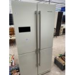 A CREAM RANGEMASTER AMERICAN STYLE FRIDGE FREEXER BELIEVED IN WORKING ORDER BUT NO WARRANTY