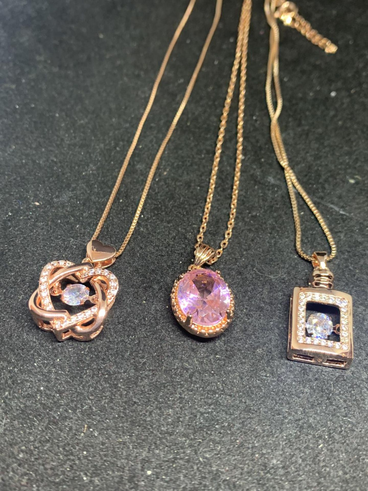 SIX SILVER NECKLACES WITH ROSE GILT AND COLOURED STONE PENDANTS - Image 2 of 3