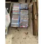 A COLLECTION OF OVER 60 UNOPENED DVDS TO INCLUDE A LARGE AMOUNT OF SEALED BLU-RAY DVDS
