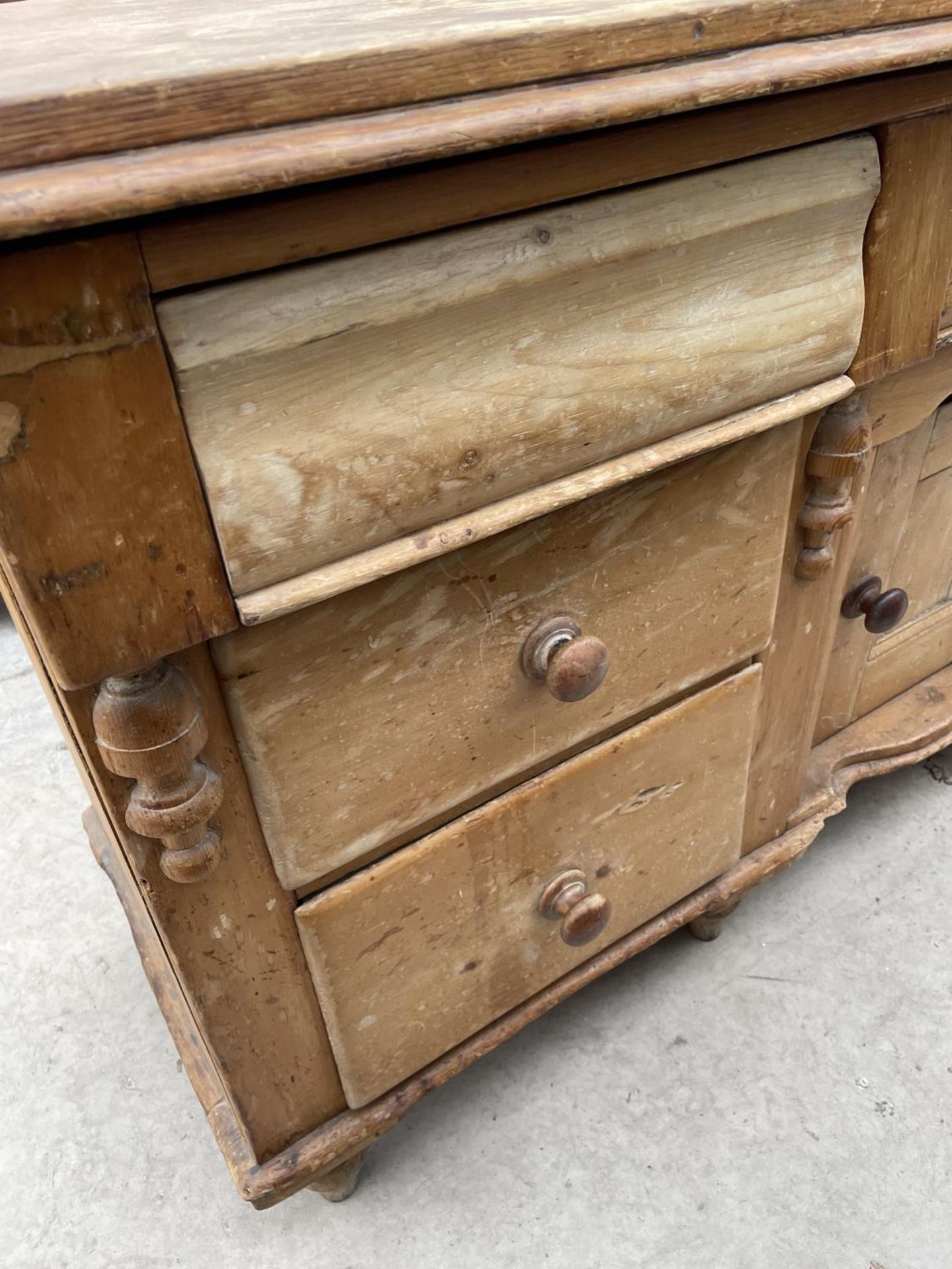 A VICTORIAN PINE KITCHEN DRESSER BASE ENCLOSING SIX DRAWERS AND CENTRAL CUPBOARD, 61" WIDE - Image 3 of 5