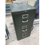 A METAL CURVED TOPPED THREE DRAWER FILING CABINET