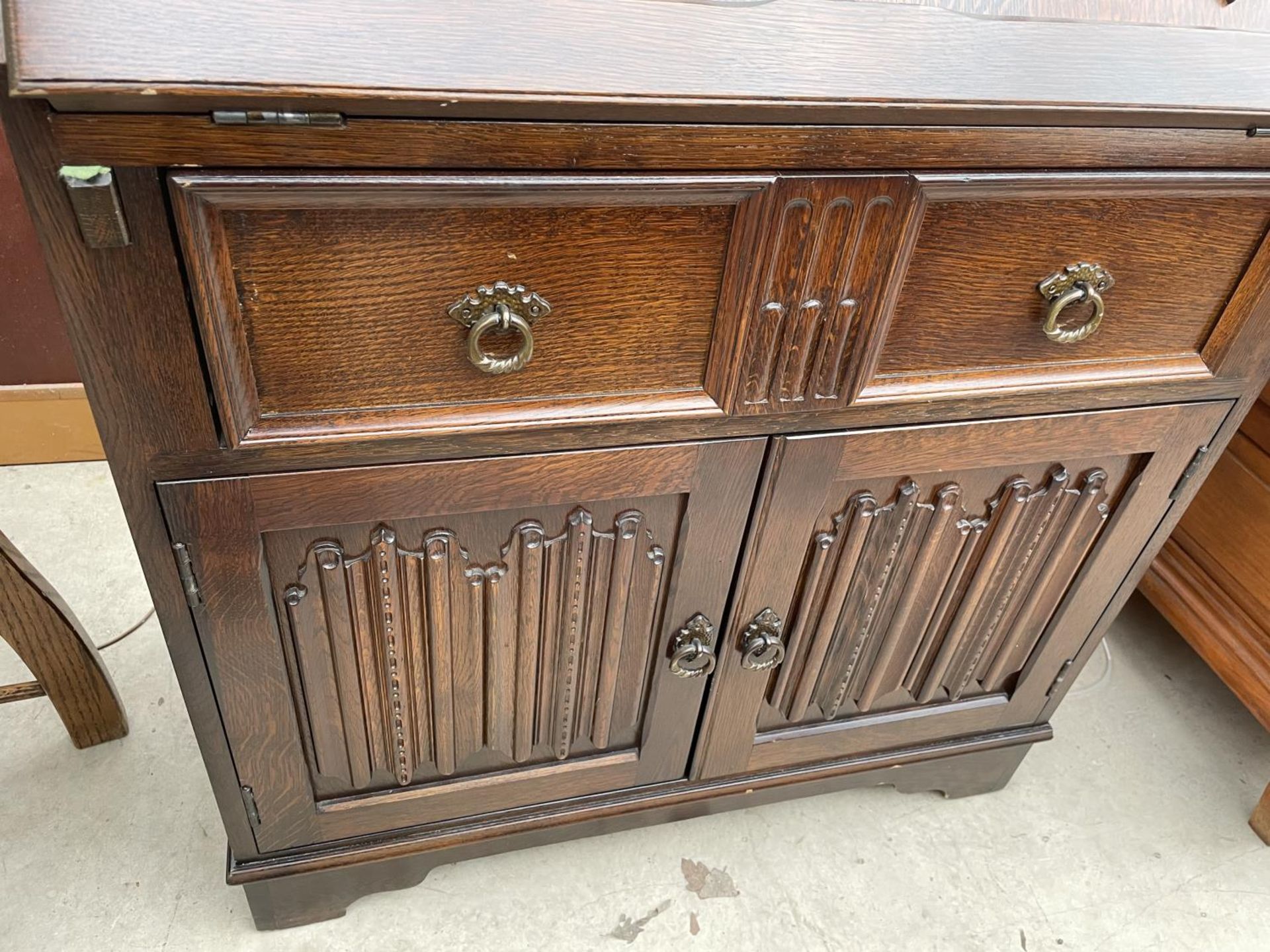 AN OAK REPRODUX STYLE LINENFOLD BUREAU, 30" WIDE - Image 3 of 4